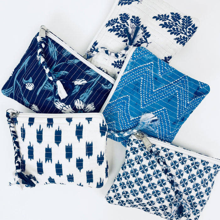 Assortment of "bright indigo" Candy Pouches from By the Sea Organics. Pretty boho block prints on 100% organic cotton. These sweet zip pouches are perfect for carrying your personal items while on the go. Each on is different, each sold separately. 6" x 5"