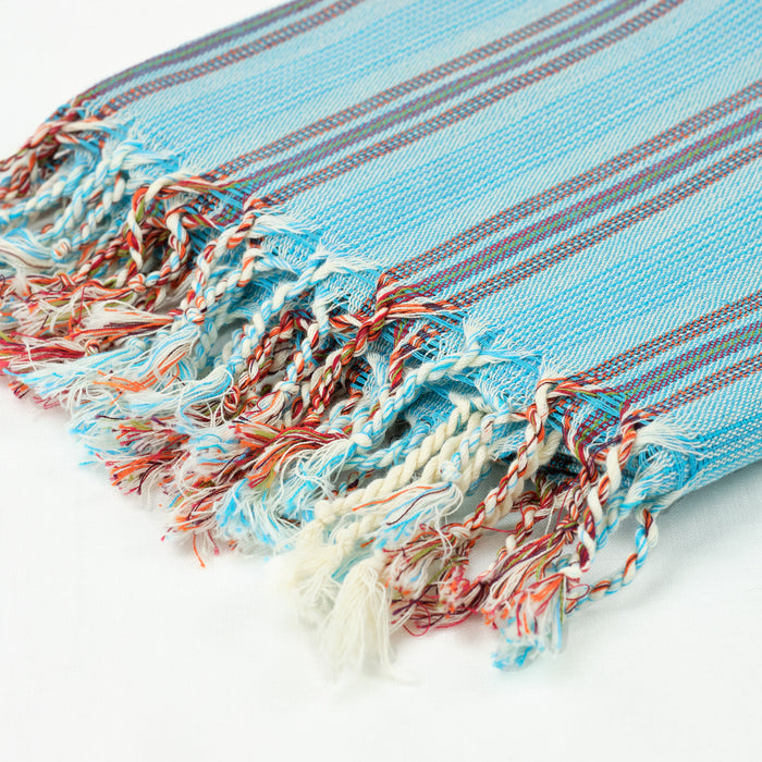 Turkish towel in turquoise with white and orange stripes