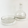 Glass + Marble serving bowl shown with its matching carafe.  Each sold separately. White marble coaster/plate can be placed in the freezer before serving and then used as a chilling plate for items served in the glass. Perfect for cocktails, lime and lemon wedges.