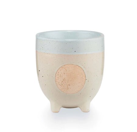 Dream Ceramic Candle by Illume. Soy wax candle with the scent of fresh air, apricot and peony. Comes in a bohemian ceramic footed vessel. 48 hour burn time.
