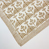 Block Print Bandana from By the Sea Organics. 100% organic cotton block printed in a gold palm pattern. Measures 21" square.