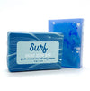 The Surf soap bar. Bright blue bar with swirls of shimmery white mica. Fragrance notes of fresh coconut, sea salt and jasmine. 4 oz. bar.
