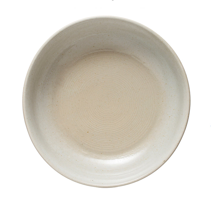 Top view of the stoneware Bayside serving dish. Finished in a fog grey glaze with a sandy undertone. Perfect for the farmhouse or coastal table setting. 10.5" diameter, 2.75" height.
