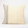 Cream pillow with blue, tan and brown multistripe border