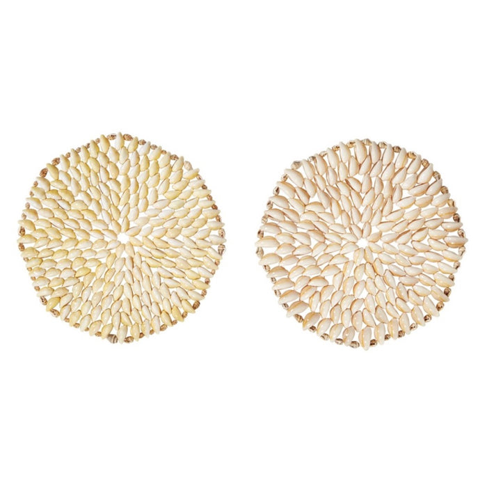 Round shell trivet made from layering cowrie shells in a circular pattern. Measures 8" diameter.