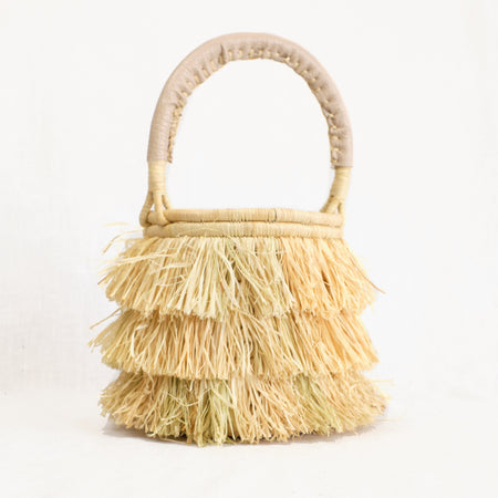 Mini natural basket bag with raffia fringe by Indego Africa