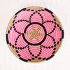 Artisan plateau basket with pink and black flower pattern by Indego Africa