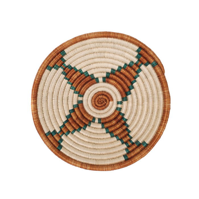 Small basket woven into a bowl shape. Natural, sepia and teal dyed grasses creat a graphic star pattern.