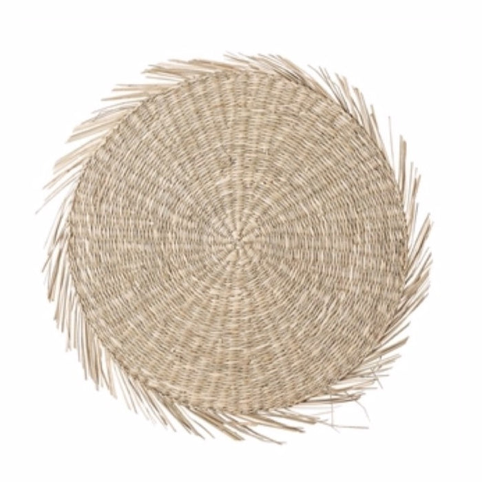 Round natural seagrass placemat is hand woven with fringe edges. 15" diameter.