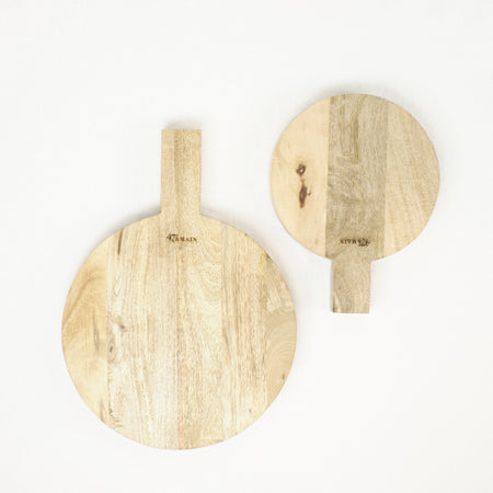 Pair of round wood serving boards. Small and large shown. Each sold separately.