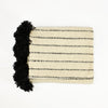 Natural cream and black striped wool blanket made by artisans in Chile by Treko Wool.