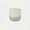 white ceramic cup with greystone base