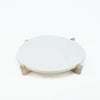 Round white marble serving board/platter on natural mango wood stand. Measures 14" diameter, 1/2" thick, 2" high on stand. 