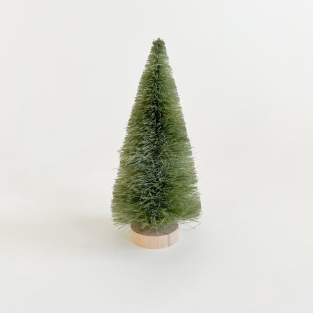 Pine green bottle brush tree with natural wood base. Available in small 6" or medium 9".