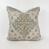 Valencia pillow features an intricate Moorish pattern in a soothing palette of ecru, sea foam green, aqua, teal and gold. Beautiful texture reflects the artisan weaving technique traditionally used on flat weave rugs. 20" square, down insert included.