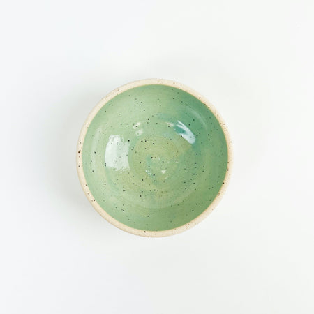 Chibiko bowl in seafoam  glaze. Coastal inspired stoneware hand crafted in Hawaii by Tamiko Claire studio. Its small proportions make it ideal for a serving of gelato or fresh berries. Measures 4" diameter 2.5" height.