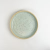 Momo dish in surf mist glaze. Coastal inspired stoneware pieces from Tamiko Claire's studio in Hawaii. The perfect size to use as a jewelry or trinket dish or to serve a  favorite cookie. Measures 6.25" diameter 1" height.