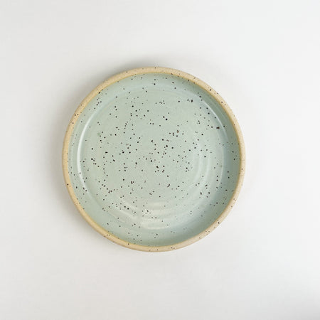 Momo dish in surf mist glaze. Coastal inspired stoneware pieces from Tamiko Claire's studio in Hawaii. The perfect size to use as a jewelry or trinket dish or to serve a  favorite cookie. Measures 6.25" diameter 1" height.