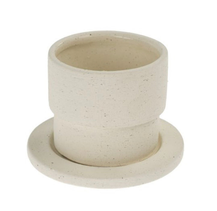 Phoebe clay pot and saucer made of matte white clay with speckled finish. Interior has a glossy white and speckled glaze. Pot measures 3.5" height x 4" diameter. 