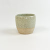 Chibiko cup in the surf mist glaze. Coastal inspired ceramics hand crafted by Tamiko Claire Studios in Hawaii. Its petite size is perfect for espresso or a small pour of wine. Measures 2.5" diameter 2.5" height.