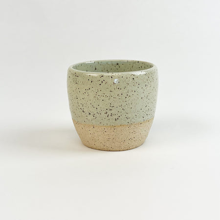 Chibiko cup in the surf mist glaze. Coastal inspired ceramics hand crafted by Tamiko Claire Studios in Hawaii. Its petite size is perfect for espresso or a small pour of wine. Measures 2.5" diameter 2.5" height.