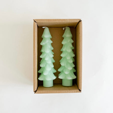 Set of two tree shaped wax taper candles in mint green. Set of 2 in Kraft box ready for gifting. Unscented. Standard taper base, 5" long.