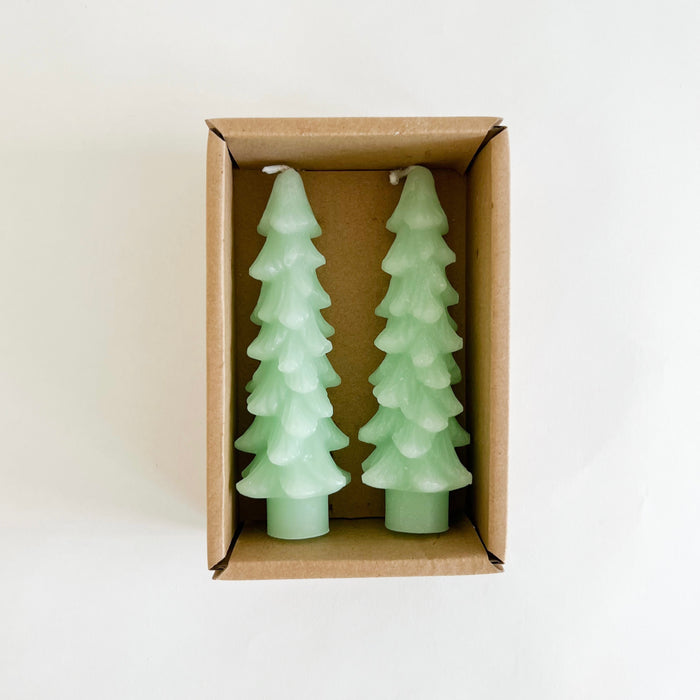 Set of two tree shaped wax taper candles in mint green. Set of 2 in Kraft box ready for gifting. Unscented. Standard taper base, 5" long.