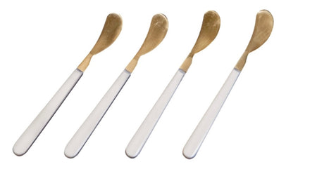 Set of 4 Blanca spreaders made of stainless steel with a brushed gold finish and ivory resin handle. Measures 6" length.