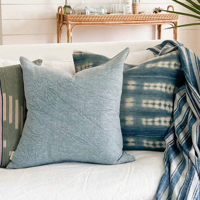 Blue crush indigo linen pillow shown with assortment of limited edition vintage indigo pillows by Linen & Sand. Each sold separately.