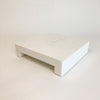 Small white wood serving board/riser. Made of mango wood with glossy white finish. Small 8" x 8" x 2"