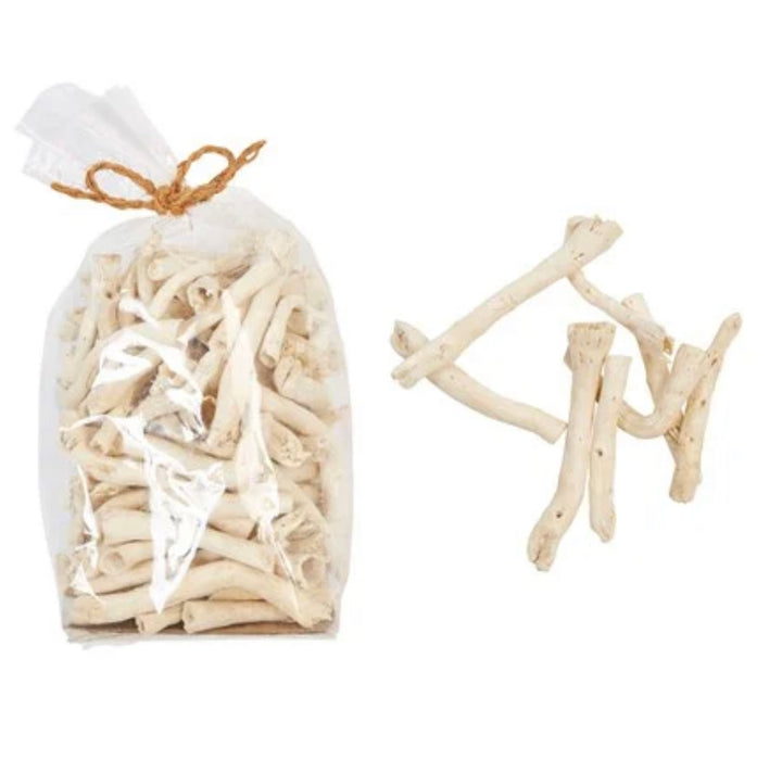 Bag of decorative dried cauliflower roots. They resemble fragments of sun bleached driftwood. Use as a bowl or vase filler. Each bag contains about 80 pieces, each piece measures approximately 4" length.