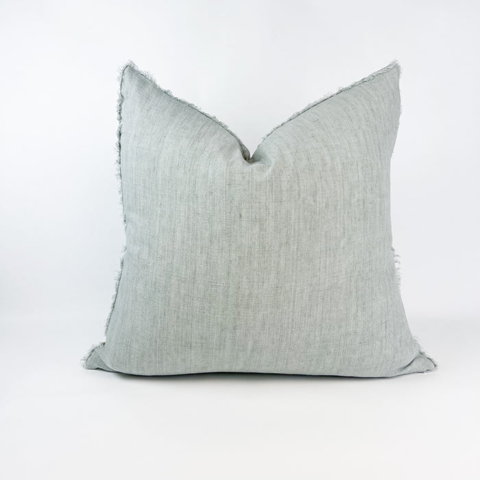 The linen fringe pillow shown in fog grey is the perfect accent for casual luxury living. 24" square pillow is generously proportioned and filled with a soft down insert. It's our favorite foundation pillow for layering with other statement patterns and textures.