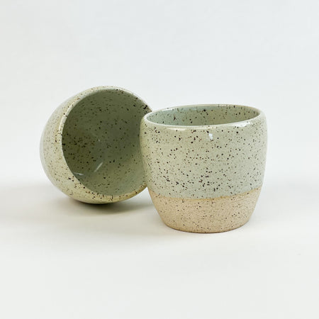 Pair of Chibiko cups in the surf mist glaze. Hand crafted natural stoneware made by Tamiko Claire in Hawaii. Coastal inspired artisan ceramics. Cup measures 2.5" diameter 2.5" height, perfect for espresso. Each sold individually.