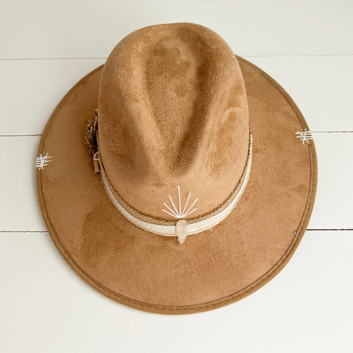 The Sparkles Hat in light camel suede with burlap and white snakeskin strap. Hand stitched symbols, dried wild flowers and a clear crystal decorate the brim.