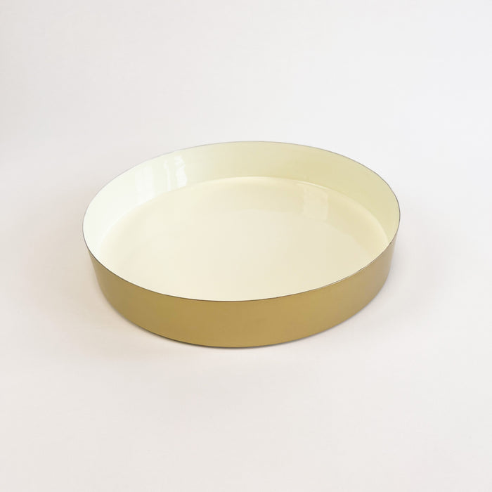 Small Sonoma brass tray with a glossy cream enamel interior. Small measures 12" diameter 2" height. Coordinates and nests with the medium and large Sonoma trays. Each sold separately. 