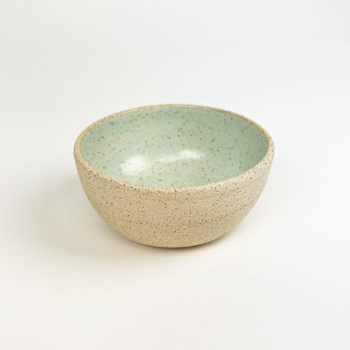 Chibiko bowl in surf mist glaze.  Natural stoneware hand crafted in Hawaii by Tamiko Claire Studio. The small proportions make it ideal for a serving of gelato or holding tiny treasures. Measures 4" diameter 2.5" height.