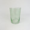 Verde (green) bubble glass tumbler. Artisan made glassware with little bubbles floating throughout. Holds approximately 8 oz. Each sold separately.