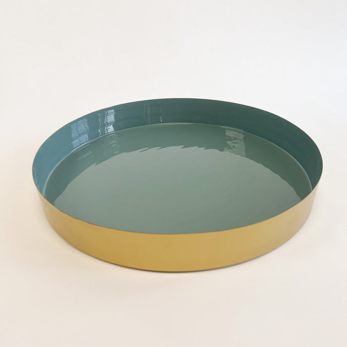 Large Laguna brass tray with glossy marine blue enamel interior.  Large measures 16" diameter, 2" height. Coordinates with the small and medium Laguna trays, each sold separately.