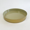 Medium Sonoma brass tray with a glossy olive green enamel interior. Medium measures 14" diameter 2" height. This tray coordinates and stacks with the small and large Sonoma trays. Each sold separately.