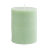 Ribbed pillar candle in holly green with powdered finish. 3" x 4" unscented candle. 55 hour burn time. Holiday decor.