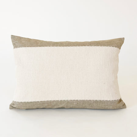 Hamptons lumbar pillow in color blocked sand and cream linen. Crisp handstitching at the color block seams. 14 x 20 inches.