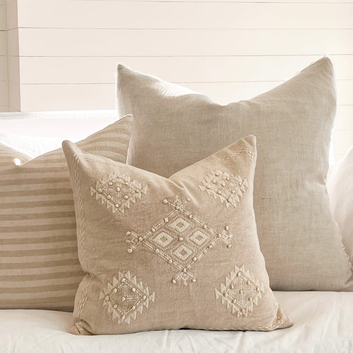 Sahara Pillow shown with Linen Fringe pillow and the White Sands stripe pillow. Each sold separately.