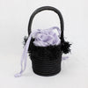 Black basket bag with lavender liner by Indego Africa