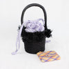 Indego Africa black basket bag with lavender lining