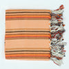orange and rust striped cotton Turkish towel with fringe