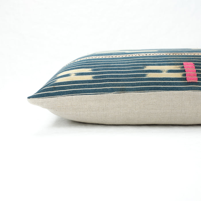 Side view of Indigo Baule Pillow with flax linen back.