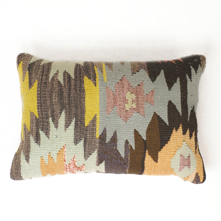 Vintage kilim pillow with abstract design in brown, plum, gold, pumpkin and mint.  Tan cotton twill back.