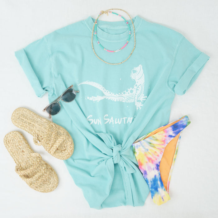 Sun Salutation graphic T with favorite beach accessories.
