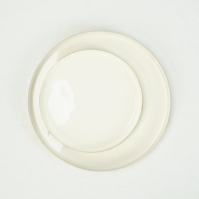 Louise Brass and white enamel trays. Two shown, circular shape, size small and medium. Made by Hawkins NY.