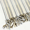 Turkish towel in cream cotton with yellow, grey and blue multistripe and fringe